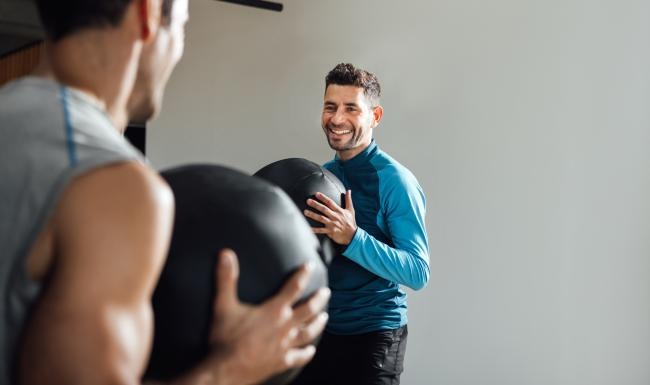 Two men who are residents working out together